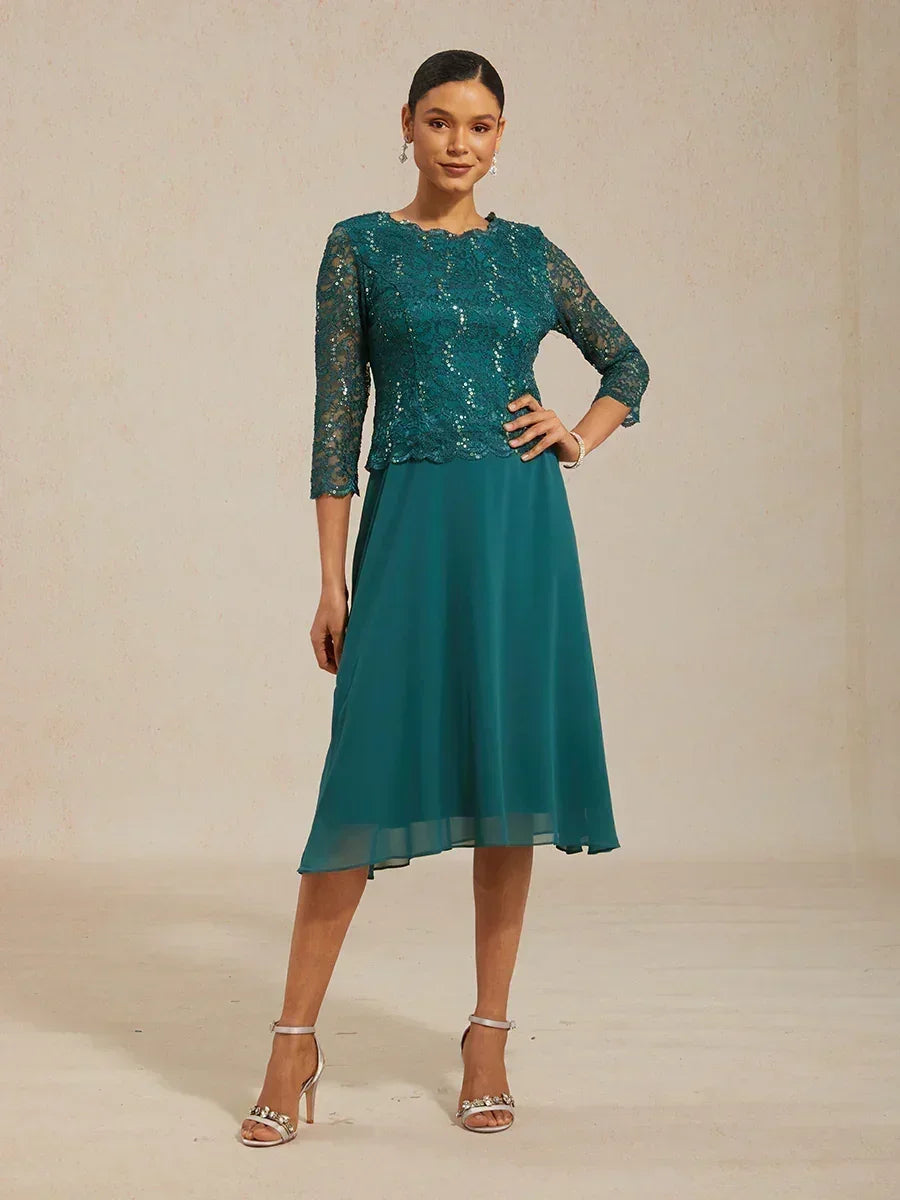 Robe midi en dentelle à manches trois quarts