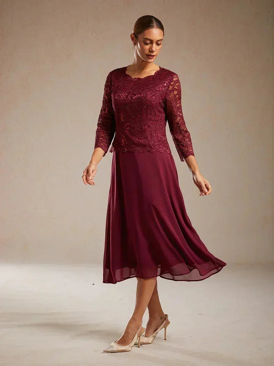 Robe midi en dentelle à manches trois quarts