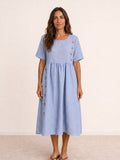 Vestido midi fluido con botones