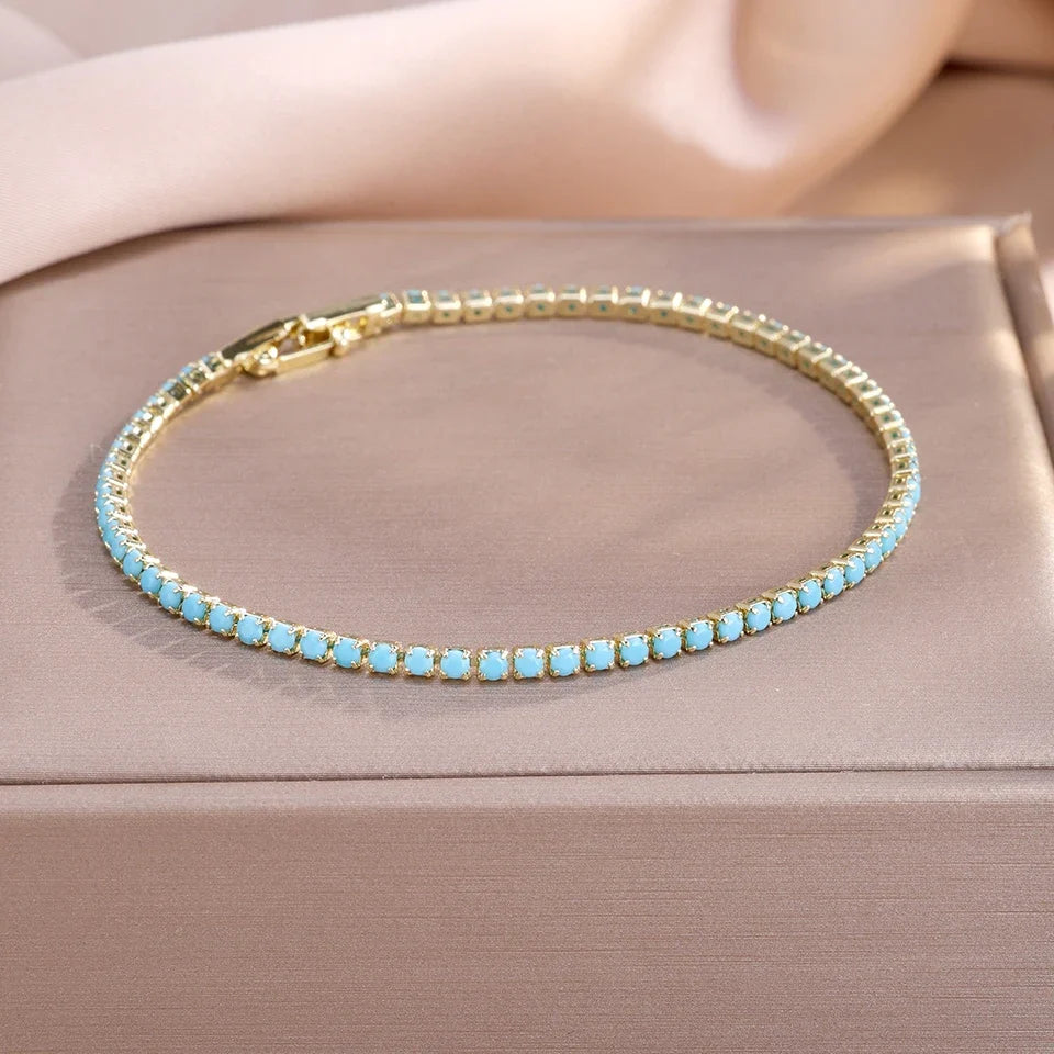 Aurora | Goldenes Tennis-Armband mit Türkis