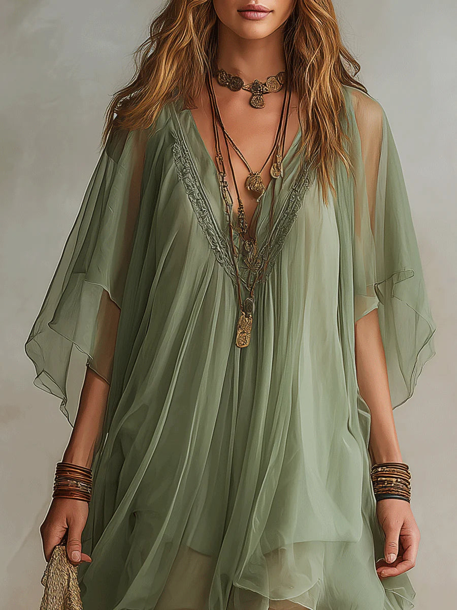 Mini-robe verte aérienne en mousseline avec décolleté en V