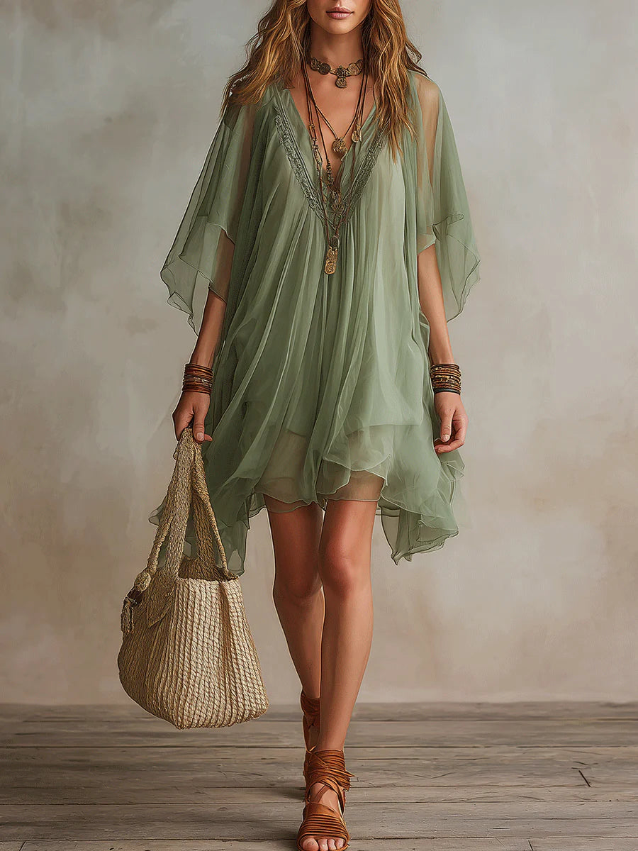 Mini-robe verte aérienne en mousseline avec décolleté en V